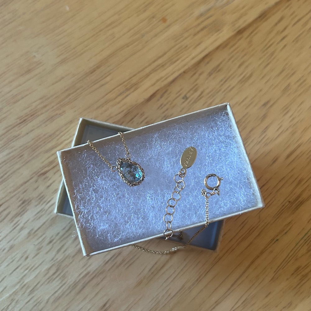Gold Necklace with Blue Gemstone